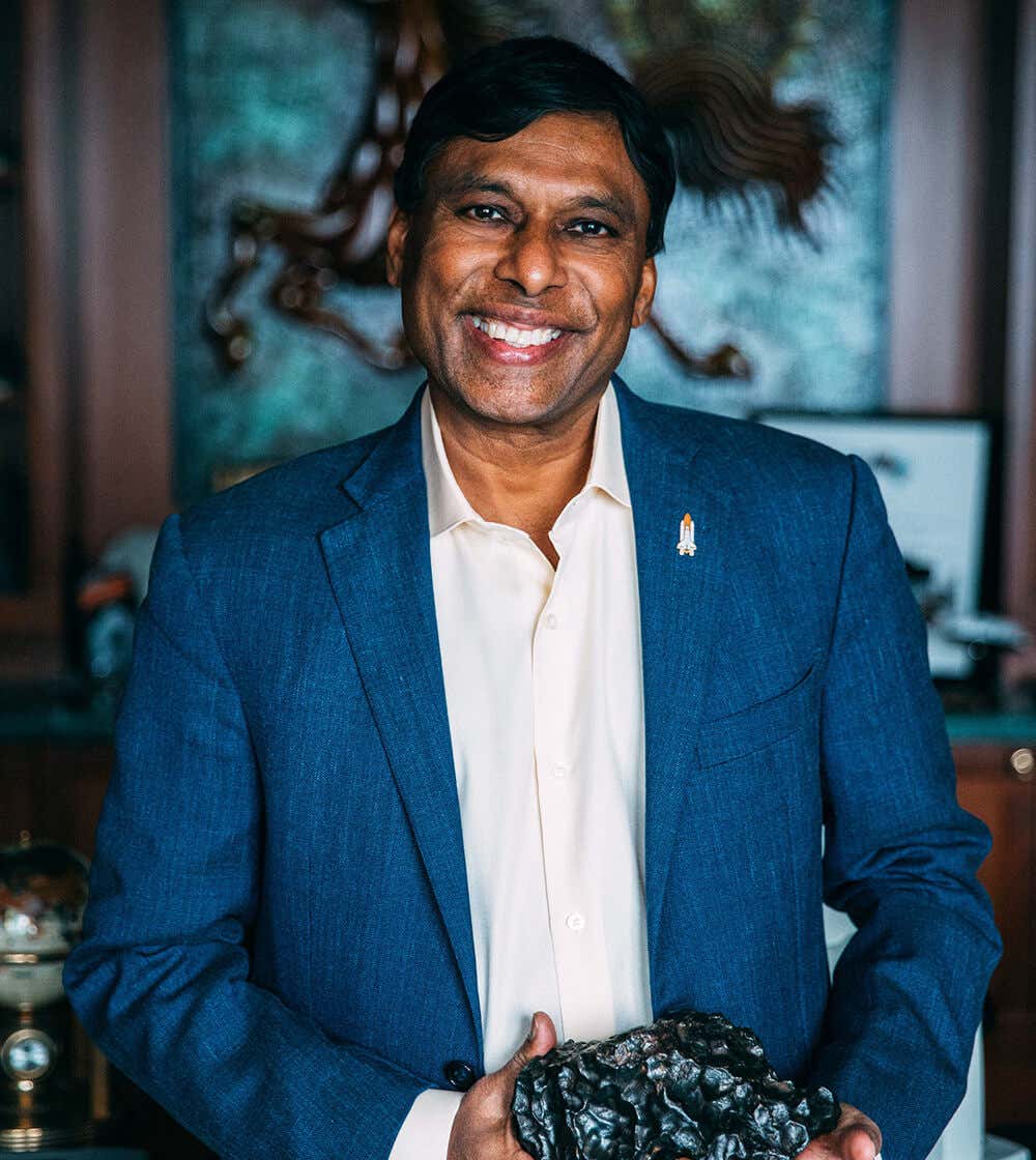 Naveen holding a meteorite