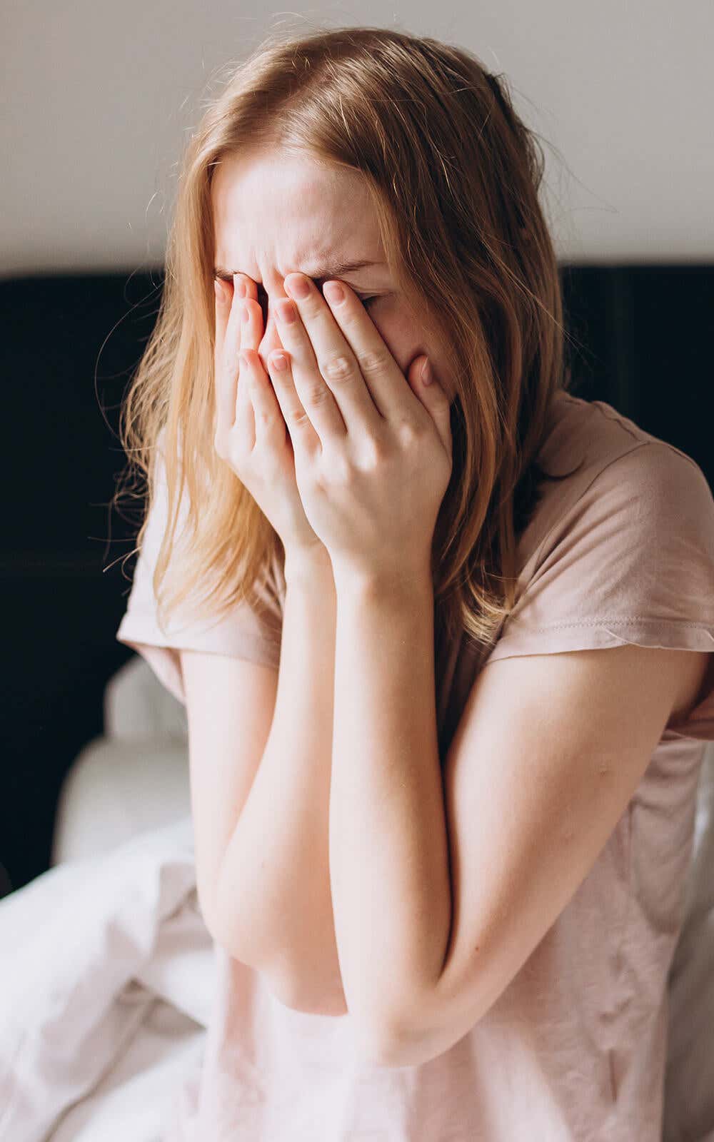 Stressful woman in bed from a bad sleep