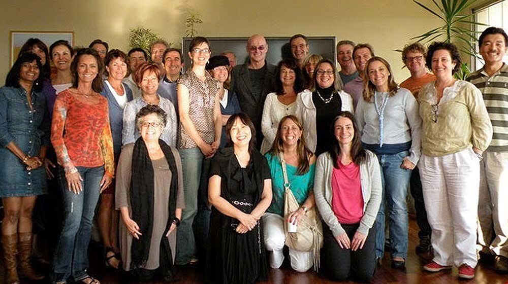 Ken Wilber with a group of participants at the Transcendent Leadership workshop.
