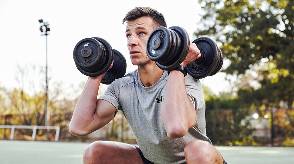 Lorenzo holding weights