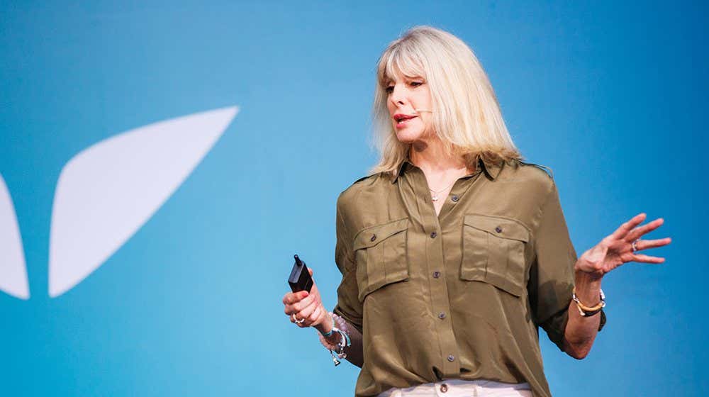 Marisa guiding an entire audience of 800 people through incredible breakthroughs