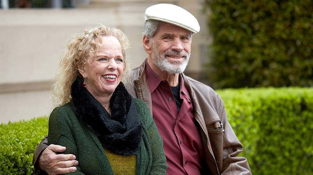 Donna & David sitting in the park together