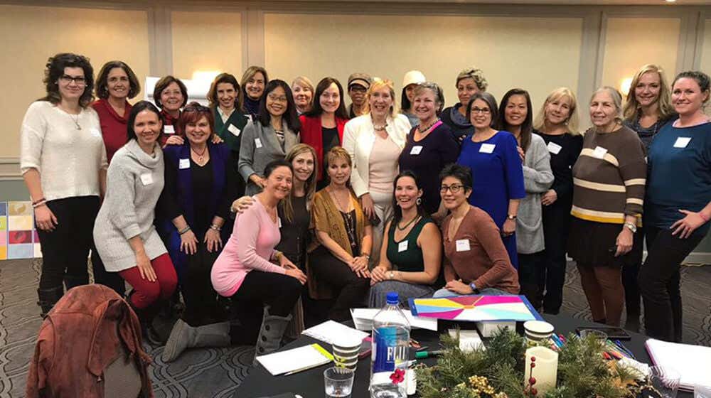 Marie Diamond with her students at an event