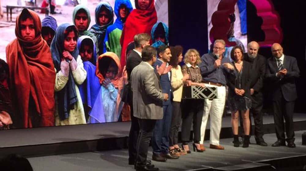 Vishen being awarded the Human Dignity XPRIZE for his ideas at XPRIZE Visioneering.