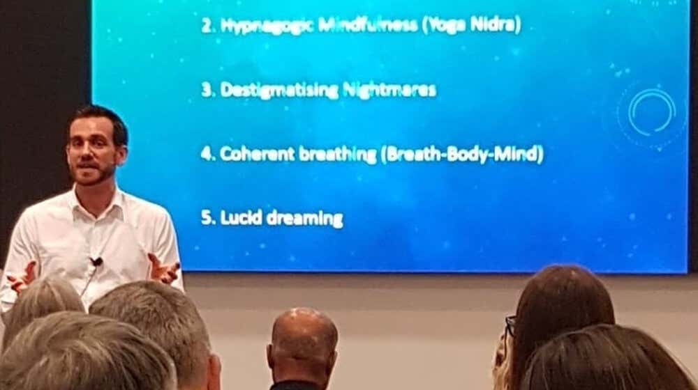 Charlie in the midst of teaching a lucid dreaming workshop