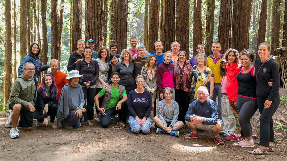 Lee with a group of teachers in the Santa Cruz redwoods.