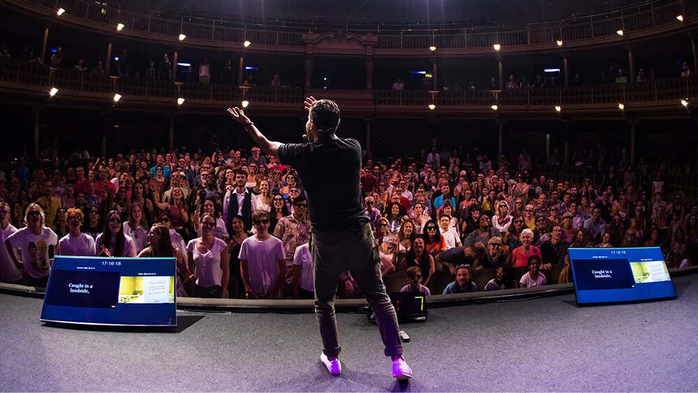Vishen on stage at Mindvalley University