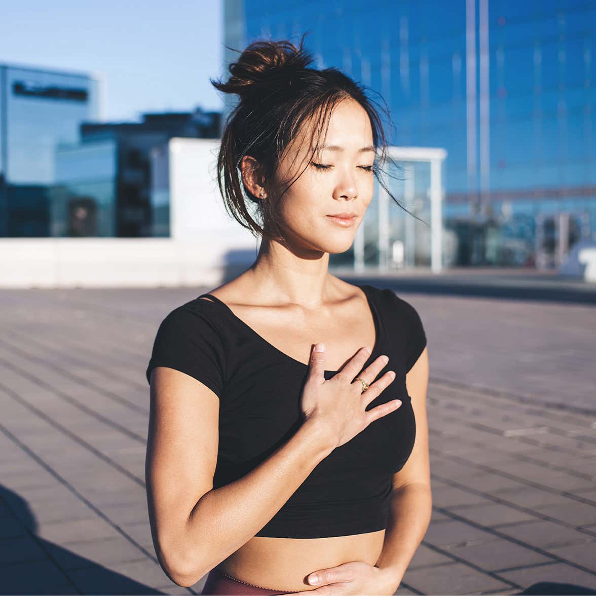A woman performing energy healing