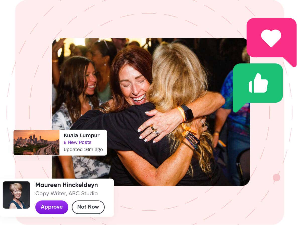 2 women hugging during Mindvalley University. Happy smile on their faces.