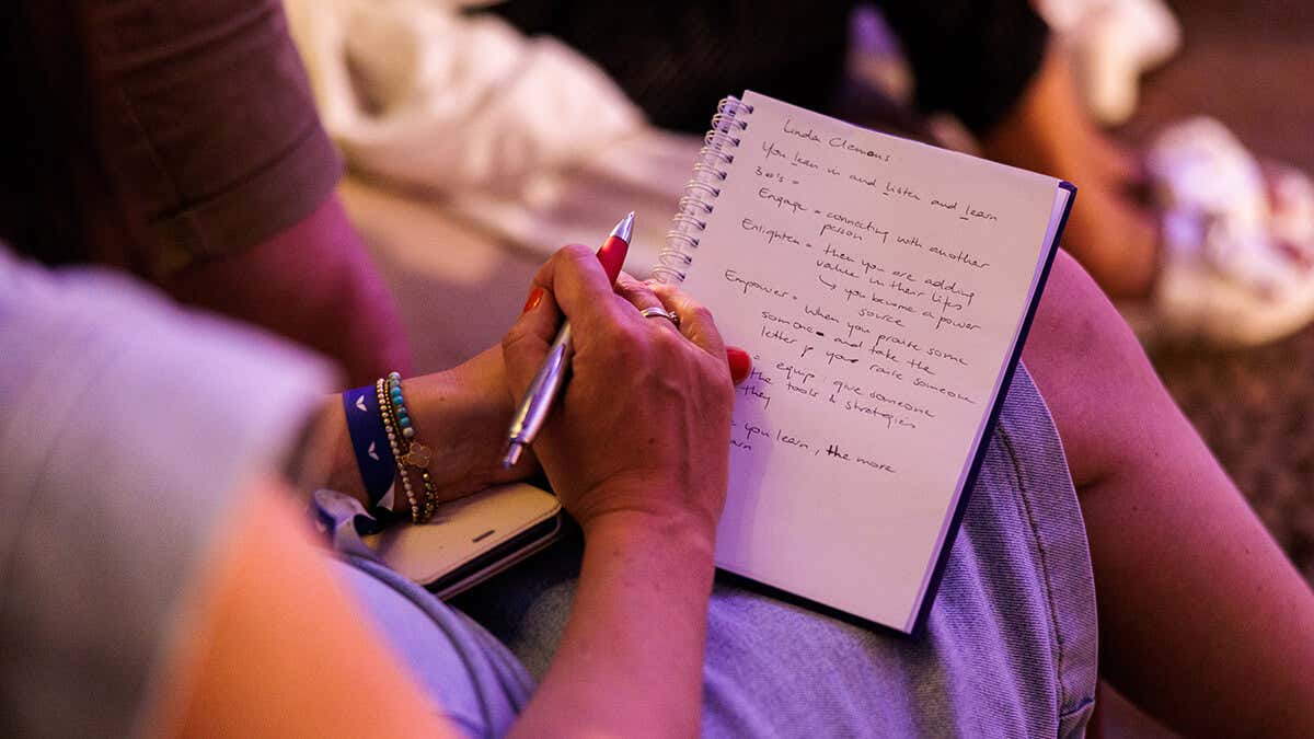 Women writing on a notebook