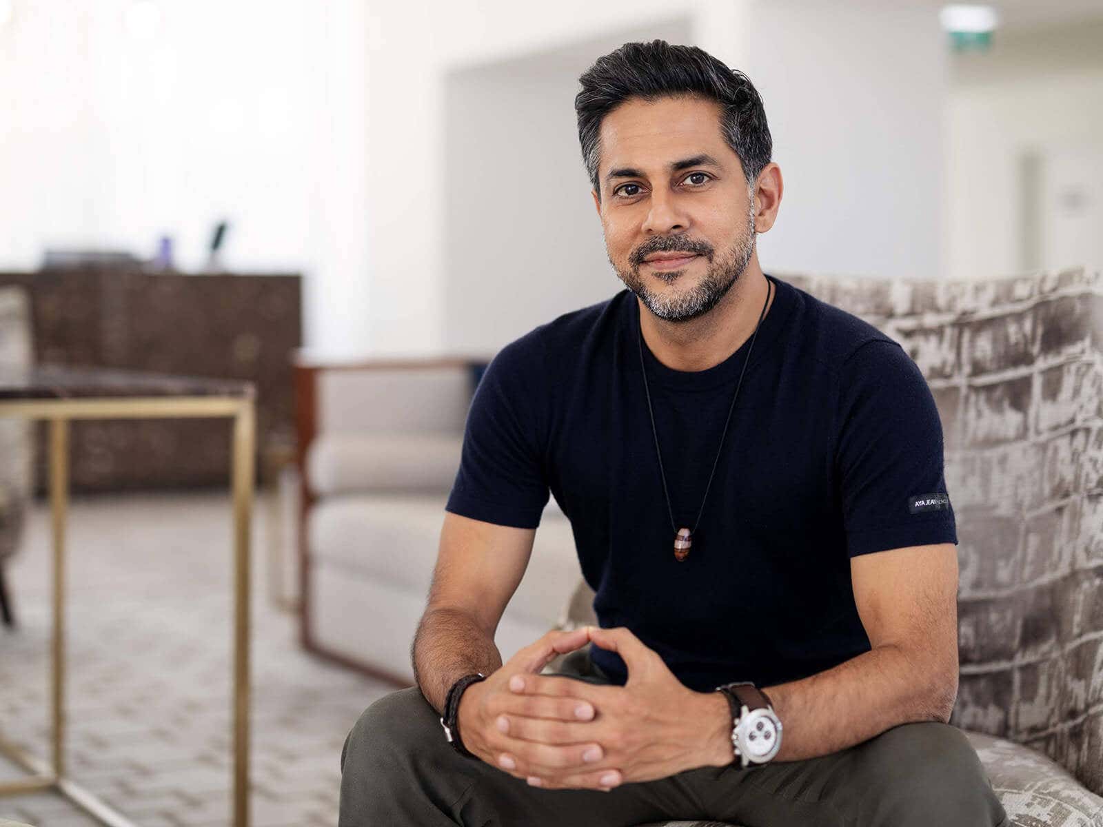 Vishen sitting on a chair