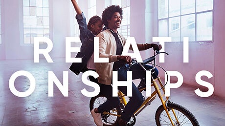 Category Relationships - happy, young couple riding a bicycle together