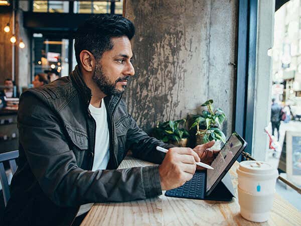 Vishen working on a tablet pc