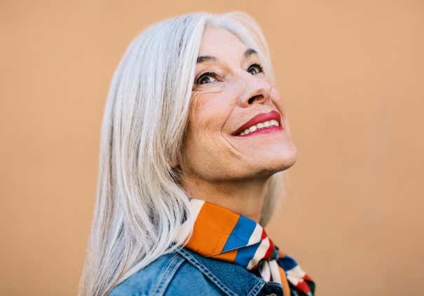 Portrait of cool senior women with grey long hairsmiling