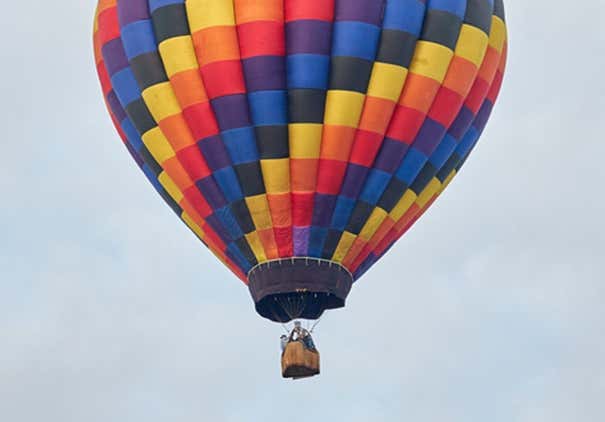 Colorful hot air balloon flying high