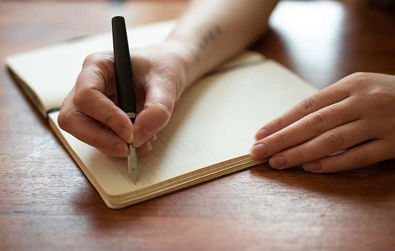 A person journaling
