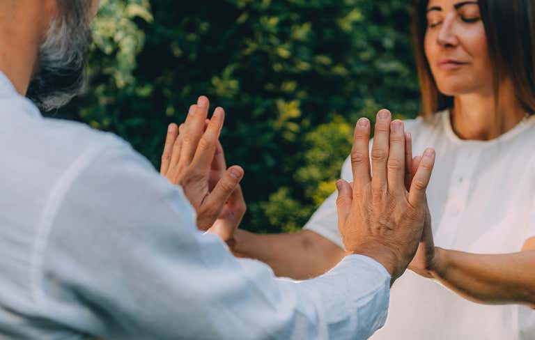 Two people touching hands