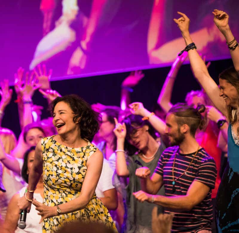 MVU students celebrating and dancing on stage